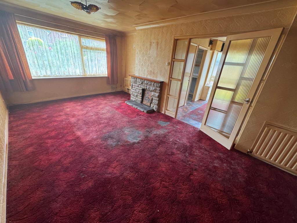 Lot: 132 - SEMI-DETACHED THREE-BEDROOM BUNGALOW FOR REFURBISHMENT WITH GARAGE - Living room